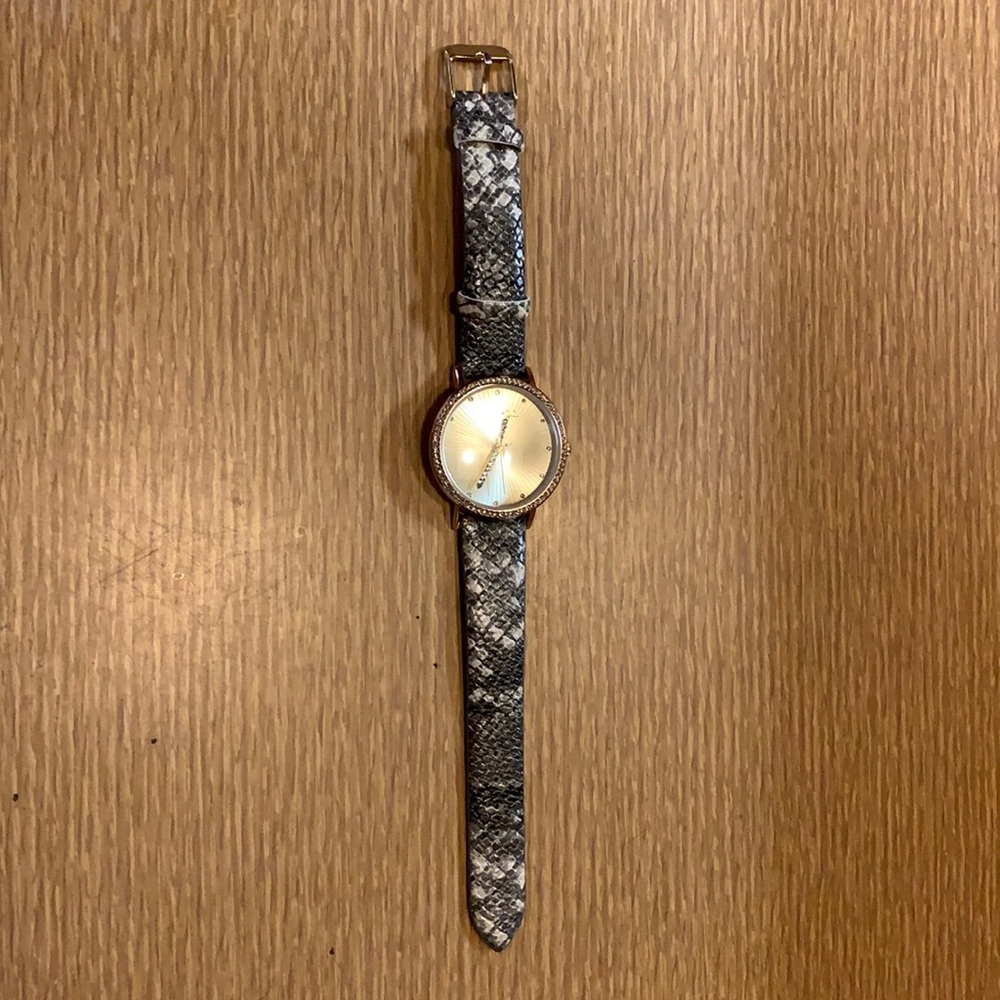 Women’s snake skin watch